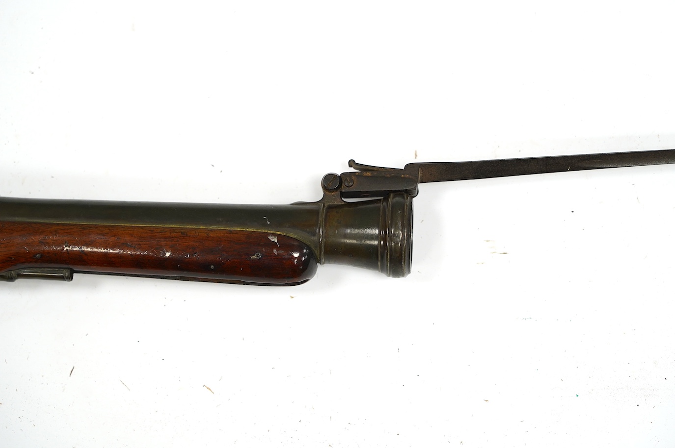 A good brass barrelled flintlock blunderbuss by Goodwin of London, c.1820, port octagonal brass barrel, Birmingham proofed, fitted with spring bayonet, signed lock with sliding safety bolt, engraved brass furniture, barr